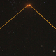 Illustration for article titled Observatorys twin lasers beam into space